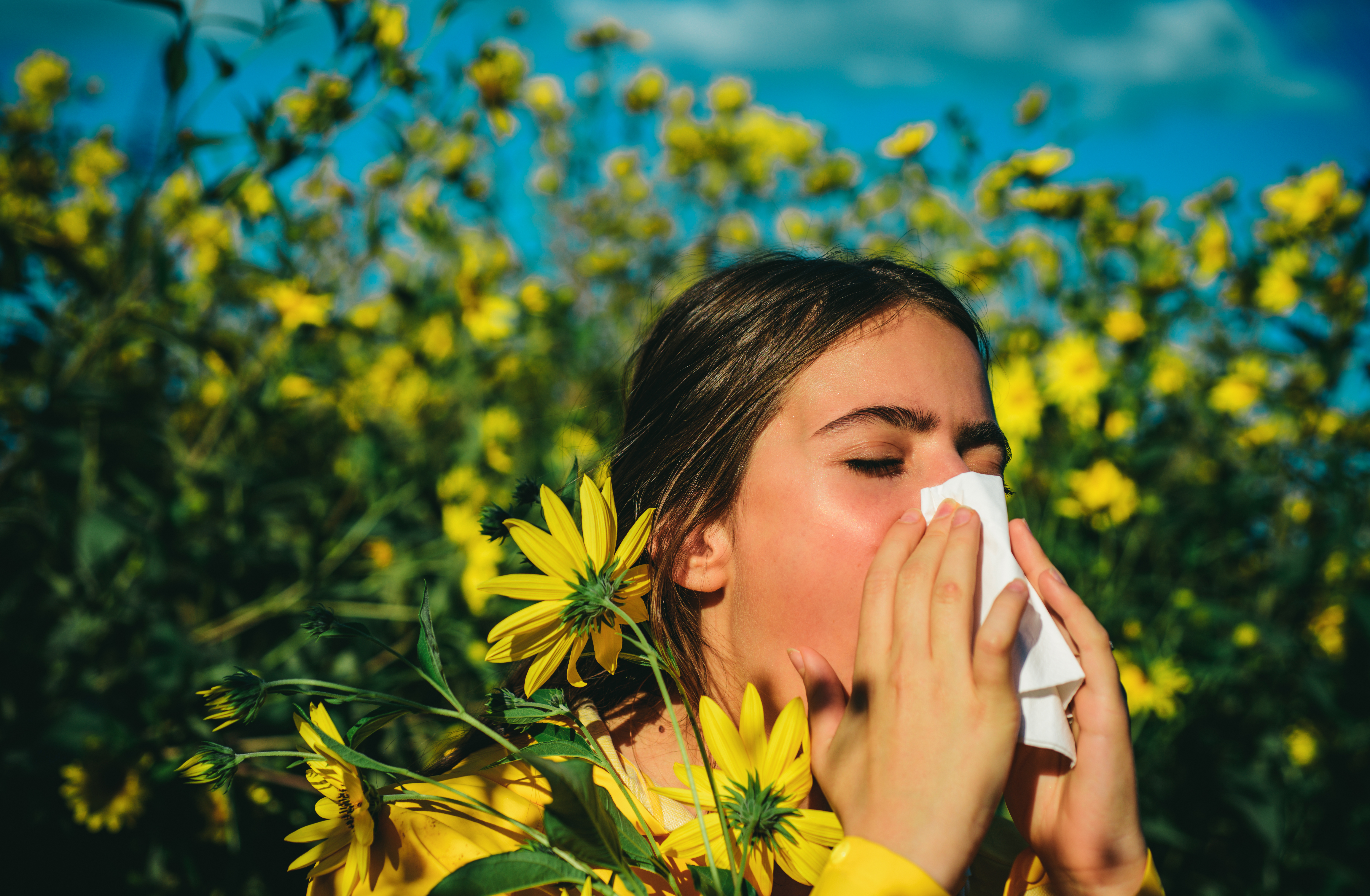 allergy-medical-seasonal-flowers-concept-woman-with-napkin-fighting-blossom-allergie-outdoor-allergy.jpg