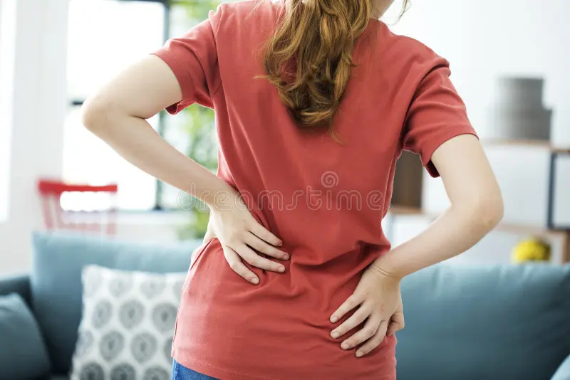 young-woman-back-pain-young-woman-back-pain-101881535.webp